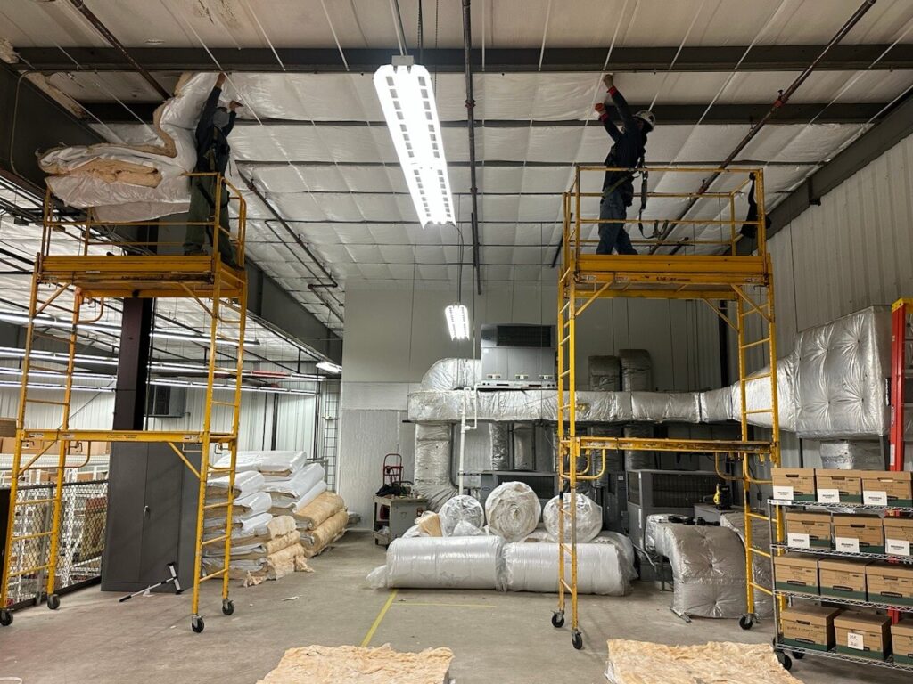 Metal Building insulation install at a commercial warehouse. 