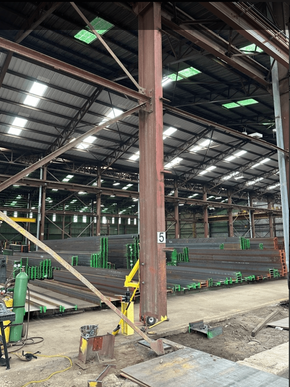 Wide angle view of steel column during replacment