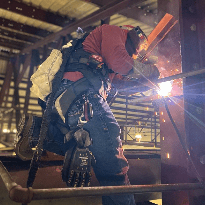 Metalguard worker welds steel column replacement Replacement