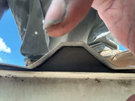 Metalguard - Close up photo of a roof panel closure.